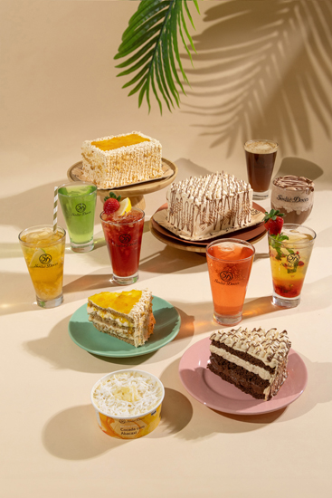 Sodiê Doces lança bolos caseiros premium e bebidas geladas zero açúcar em parceria com a Red Bull